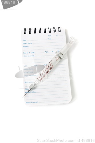 Image of Medical notebook and syringe needle