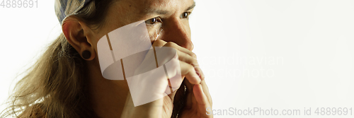 Image of Caucasian young man\'s close up shot on studio background, flyer
