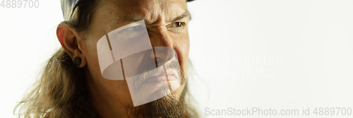 Image of Caucasian young man\'s close up shot on studio background, flyer