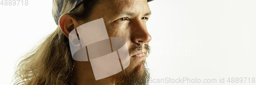 Image of Caucasian young man\'s close up shot on studio background, flyer