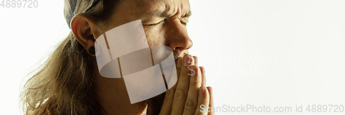Image of Caucasian young man\'s close up shot on studio background, flyer