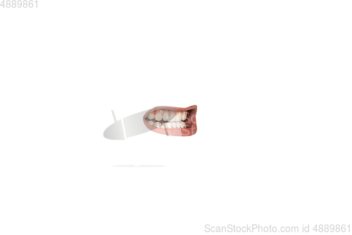 Image of Close-up view of female mouth wearing lipstick isolated on white studio background