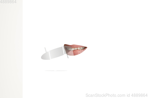 Image of Close-up view of female mouth wearing lipstick isolated on white studio background