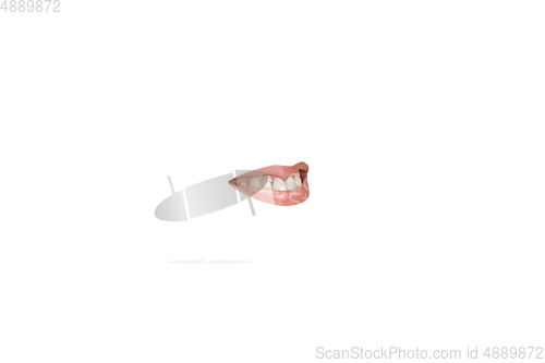 Image of Close-up view of female mouth wearing lipstick isolated on white studio background