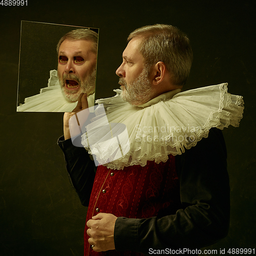 Image of Medieval man as a king, surreal look with mouth instead eyes