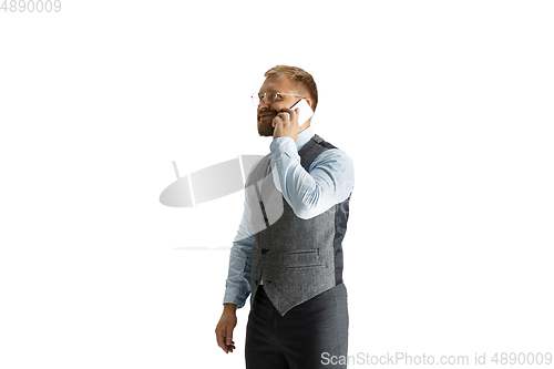 Image of Cheerful handsome businessman isolated over white studio background