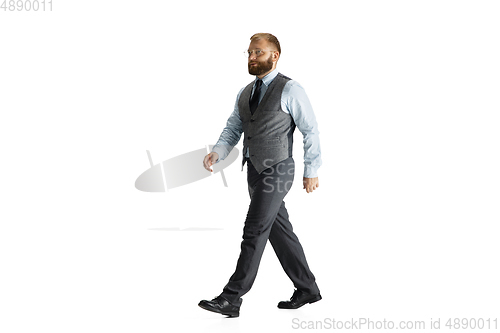 Image of Cheerful handsome businessman isolated over white studio background