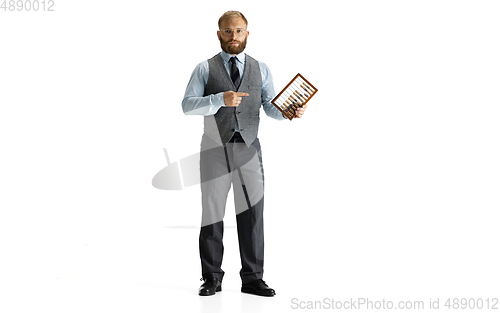 Image of Cheerful handsome businessman isolated over white studio background