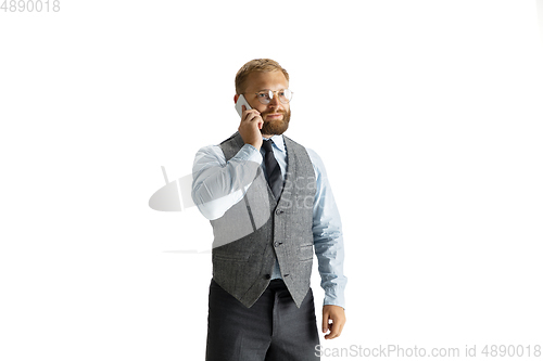 Image of Cheerful handsome businessman isolated over white studio background