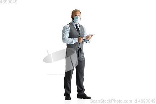 Image of Cheerful handsome businessman isolated over white studio background