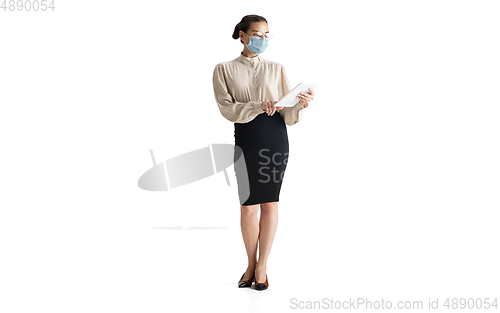 Image of Beautiful business woman, secretary, manager isolated on white studio background.
