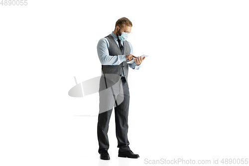 Image of Cheerful handsome businessman isolated over white studio background