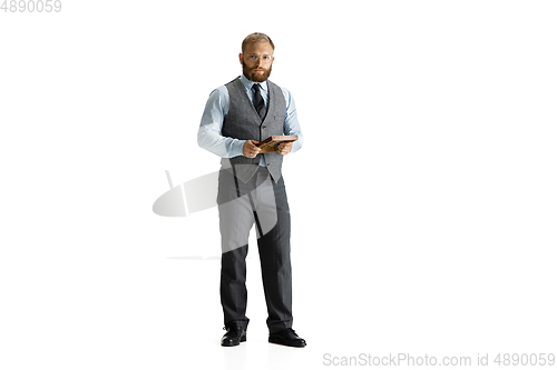 Image of Cheerful handsome businessman isolated over white studio background