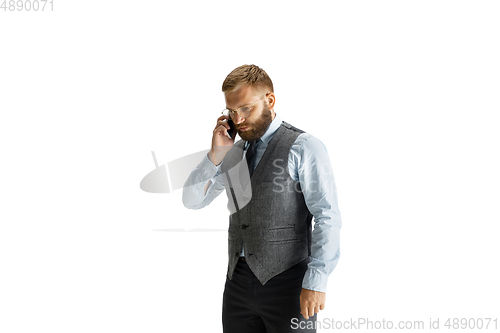 Image of Cheerful handsome businessman isolated over white studio background