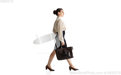 Image of Beautiful business woman, secretary, manager isolated on white studio background.