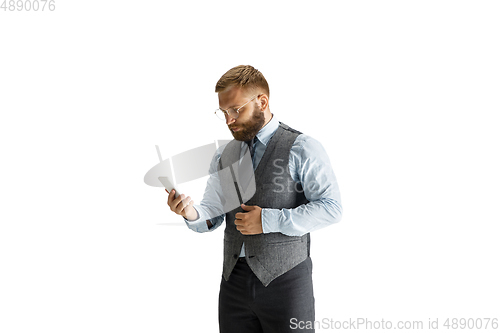 Image of Cheerful handsome businessman isolated over white studio background