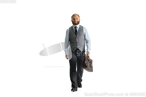 Image of Cheerful handsome businessman isolated over white studio background