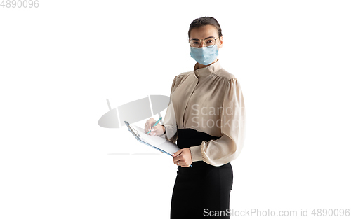 Image of Beautiful business woman, secretary, manager isolated on white studio background.