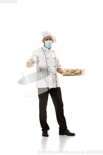 Image of Cooker, chef, baker in uniform isolated on white background, gourmet.