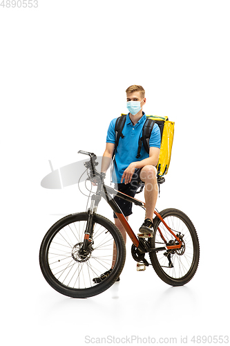 Image of Deliveryman isolated on white studio background. Contacless delivery service during quarantine.