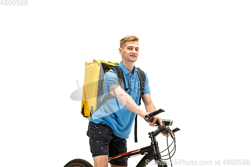 Image of Deliveryman isolated on white studio background. Contacless delivery service during quarantine.