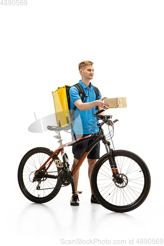 Image of Deliveryman isolated on white studio background. Contacless delivery service during quarantine.