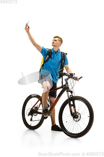 Image of Deliveryman isolated on white studio background. Contacless delivery service during quarantine.