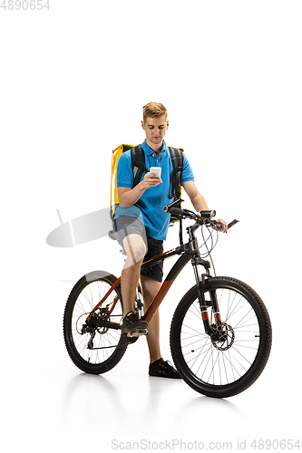 Image of Deliveryman isolated on white studio background. Contacless delivery service during quarantine.