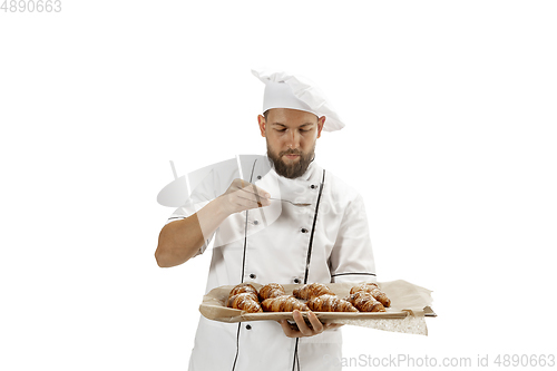 Image of Cooker, chef, baker in uniform isolated on white background, gourmet.