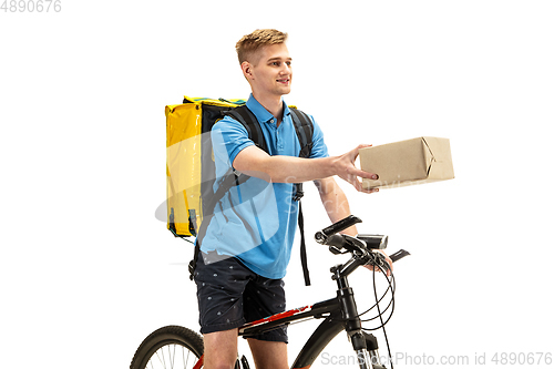 Image of Deliveryman isolated on white studio background. Contacless delivery service during quarantine.