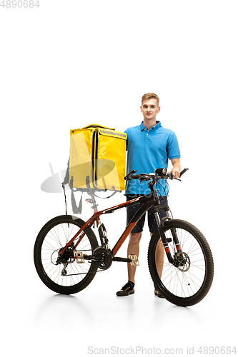 Image of Deliveryman isolated on white studio background. Contacless delivery service during quarantine.