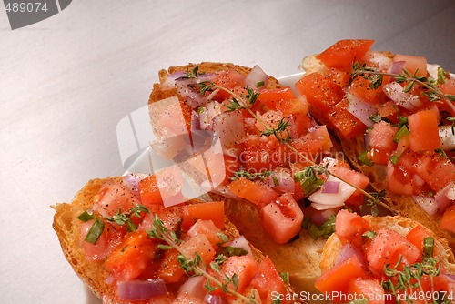Image of Tomato and onion bruschetta with thyme