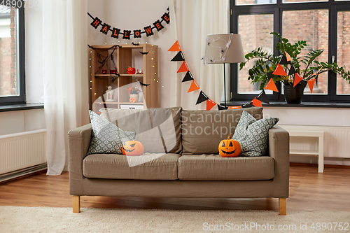 Image of jack-o-lanterns and halloween decorations at home