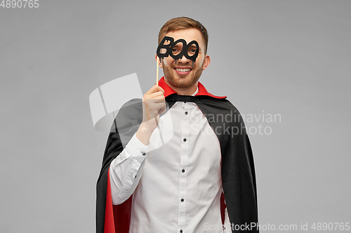 Image of happy man in halloween costume of vampire