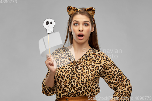 Image of surprised woman in halloween costume of leopard