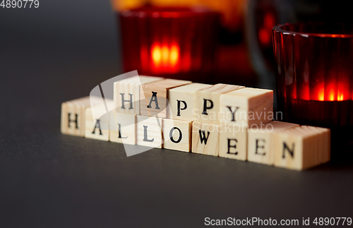 Image of wooden toy blocks with happy halloween letters