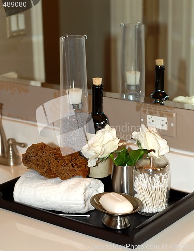 Image of Toiletries and bath items on bathroom vanity