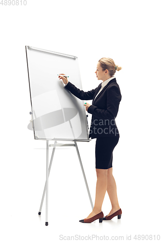 Image of Young woman, accountant, booker in office suit isolated on white studio background