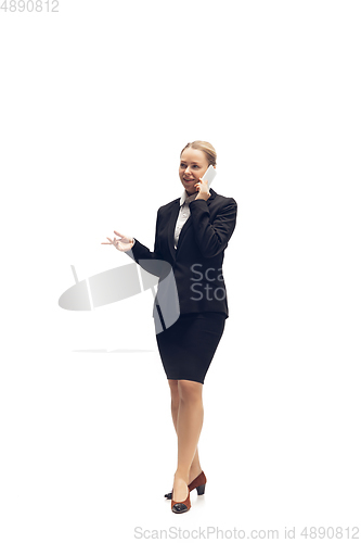 Image of Young woman, accountant, booker in office suit isolated on white studio background