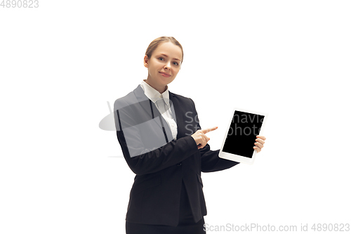 Image of Young woman, accountant, booker in office suit isolated on white studio background