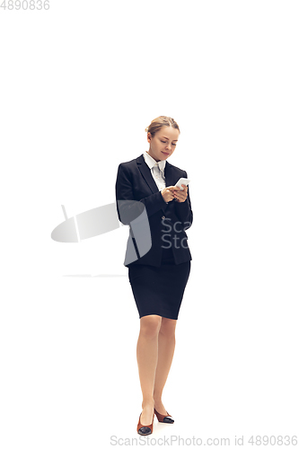 Image of Young woman, accountant, booker in office suit isolated on white studio background