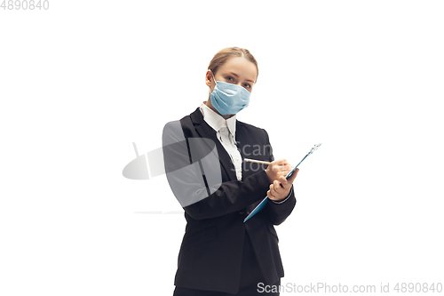 Image of Young woman, accountant, booker in office suit isolated on white studio background