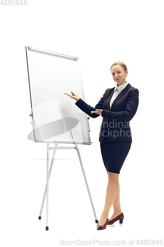 Image of Young woman, accountant, booker in office suit isolated on white studio background