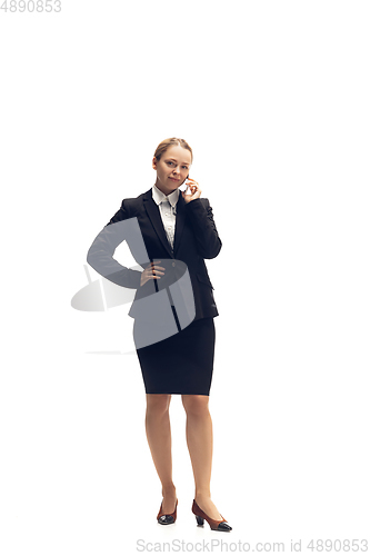 Image of Young woman, accountant, booker in office suit isolated on white studio background