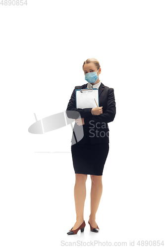 Image of Young woman, accountant, booker in office suit isolated on white studio background