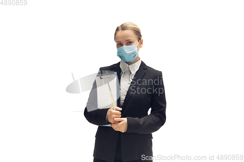 Image of Young woman, accountant, booker in office suit isolated on white studio background