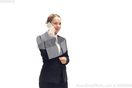 Image of Young woman, accountant, booker in office suit isolated on white studio background