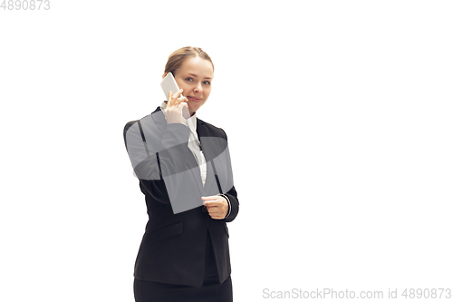 Image of Young woman, accountant, booker in office suit isolated on white studio background