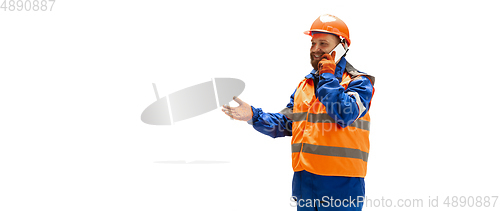 Image of Handsome contractor, builder isolated over white studio background