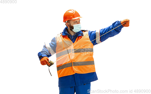 Image of Handsome contractor, builder isolated over white studio background